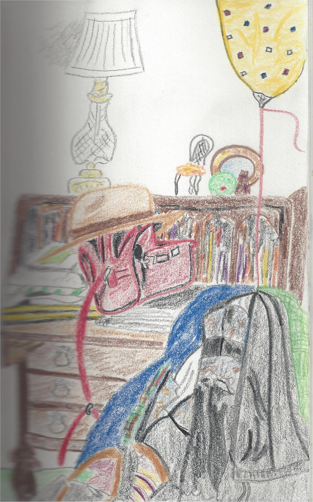 straw hat on a cluttered desk